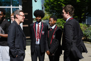 Mayor of Greater Manchester, Andy Burnham, talks to Trinity students.